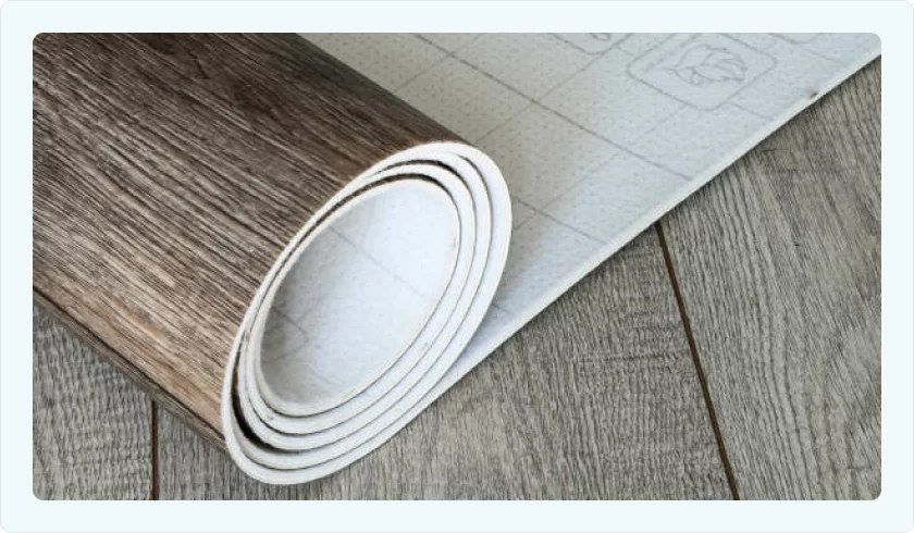 Vinyl flooring being unwrapped